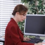 Woman working from her computer